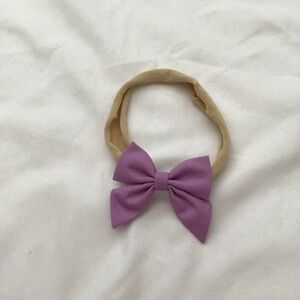 (Like New) Modern Piggy Mini Piggy Bow in Striking Purple on Nylon Headband